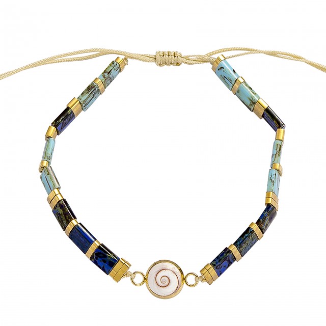 Bracelet perles plates doré...
