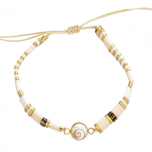 Bracelet perles plates doré...